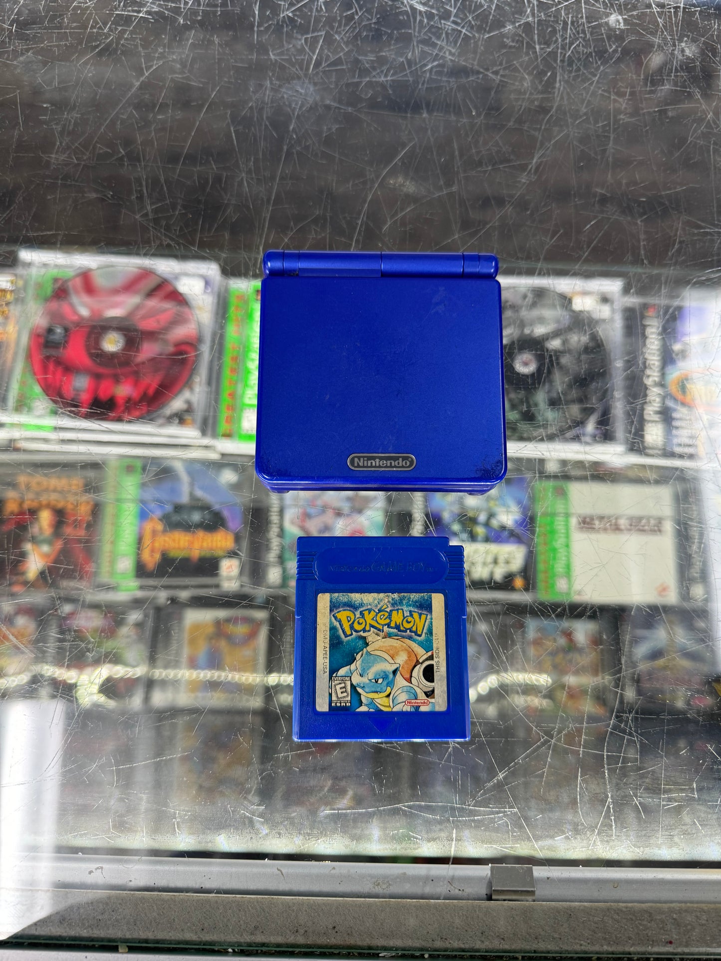 Gameboy Advance SP with Pokemon Blue & Charger $180